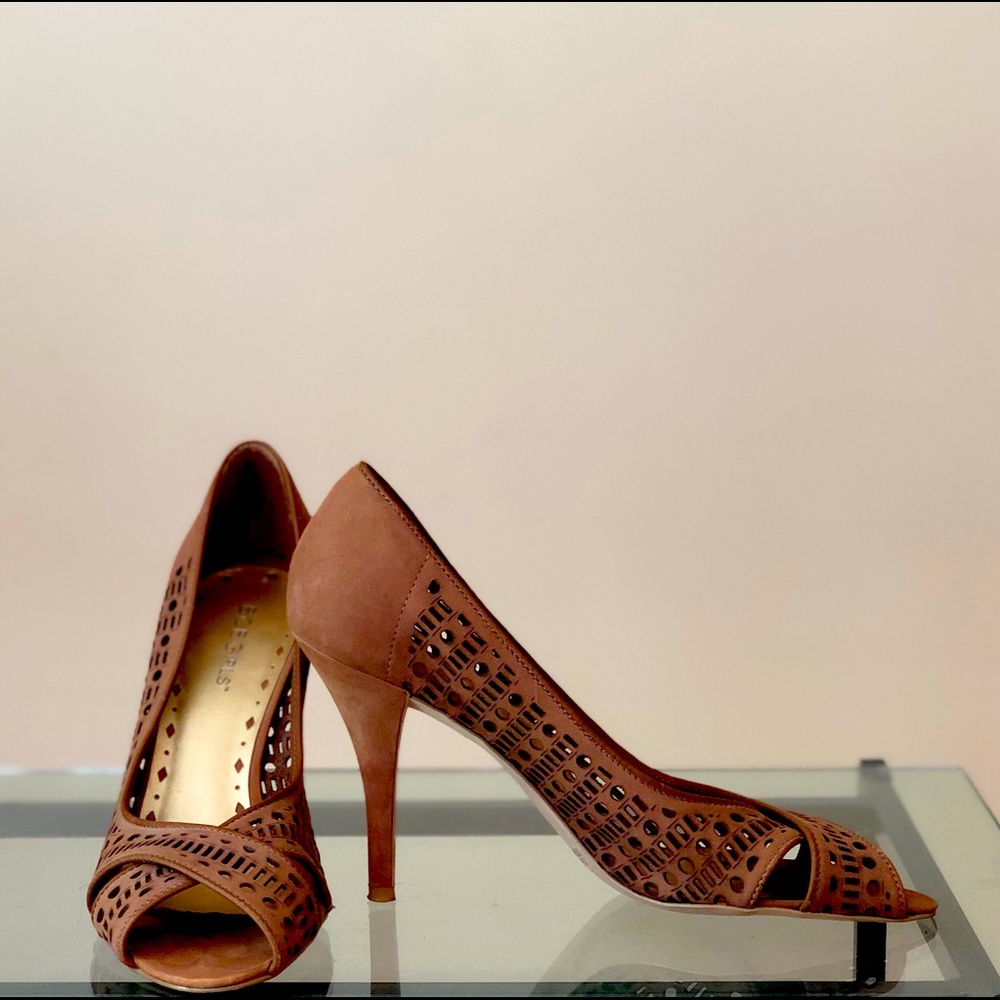 BCB Girls leather laser-cut pumps.